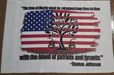 Custom marine-grade printed flag featuring The Veterans Creed original tree of liberty design and Thomas Jefferson quote
